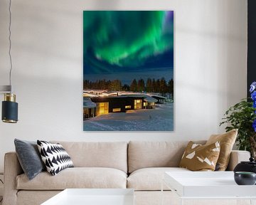 Aurora over huts in winter in Kuusamo, Finland by Rico Ködder