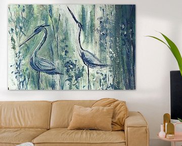 Blue-green artwork of two herons by Emiel de Lange
