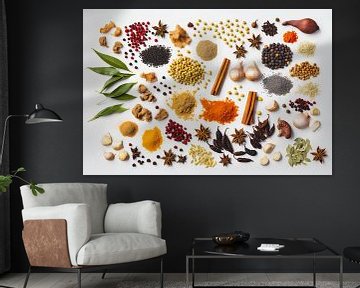 Various herbs and spices against a white background by Roger VDB