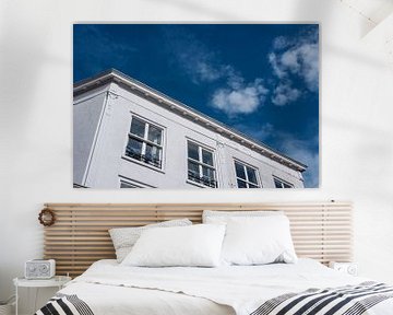 White building against blue sky