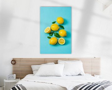 Lemons on a blue background. by Ruurd Dankloff