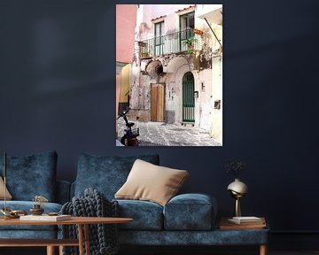 Sunny street on Procida with white house and a bicycle by Judith van Wijk