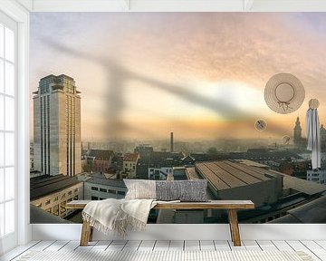 Zonsopgang met de boekentoren van Gent