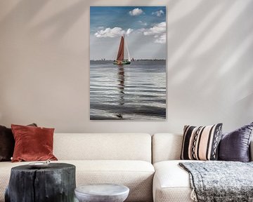 Friesian sailing vessel, skûtsje, on the Heegermeer lake in spring sunshine by Harrie Muis