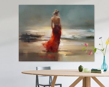 De vrouw op het strand in de rode jurk