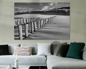 Paalhoofden op het strand bij Domburg van Zeeland op Foto