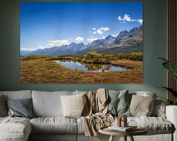 Views over water atop the New Zealand Fjords by Troy Wegman