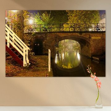 Quintine bridge over foggy Nieuwegracht in Utrecht