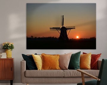 A Windmill in the Sunset van Manuel Oost