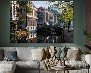 Reflections on Mauritskade: Tranquil water and urban charms by Denny van der Vaart