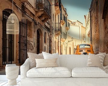 Old yellow Fiat 500 in Syracuse, Sicily, Italy. by Ron van der Stappen