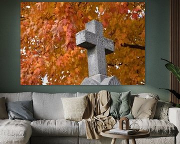 A cross in the cemetery in autumn by Claude Laprise