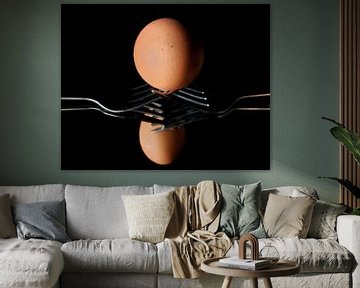 Balancing egg on forks. by Corine Dekker