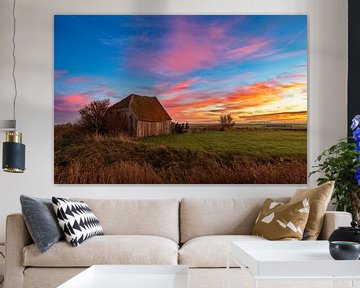 Lever de soleil sur un hangar à Texel sur Pieter van Dieren (pidi.photo)