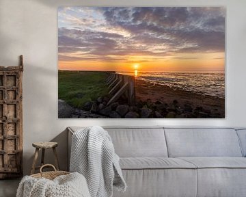 Mur de la mer des Wadden au coucher du soleil sur Bram Lubbers