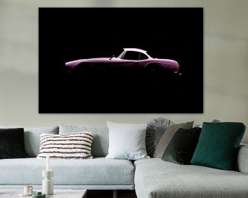 Pink vintage sports car by Andreas Berheide Photography
