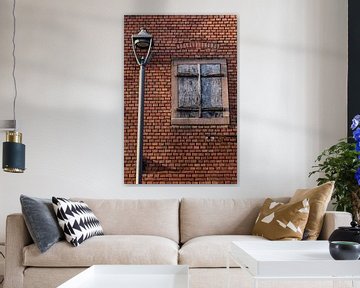 Wall with grey-blue shutter and lamppost by Stadspronk