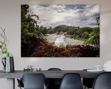 Scenic photo of the Bahorok River in Bukit Lawang, Sumatra, Indonesia. by Made by Voorn