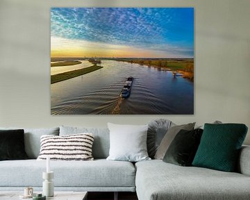 Vrachtship op de IJssel tijdens zonsondergang in de lente van Sjoerd van der Wal Fotografie