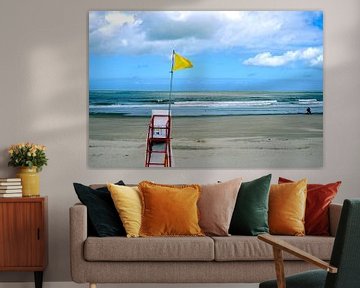 Yellow beach flag to lifeguard chair by Lilly Wonderz