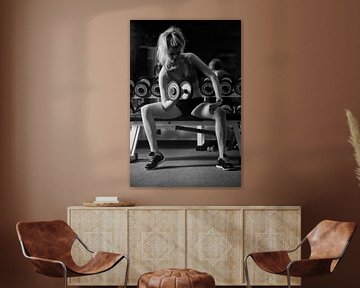 Blonde doing weight training in black and white by Tilo Grellmann