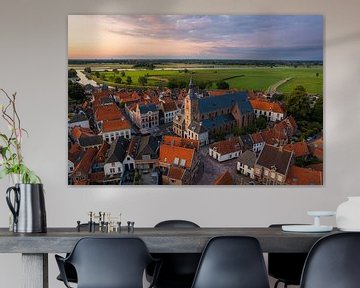 Sunset hattem with zwolle and the IJssel in the background by Thomas Bartelds