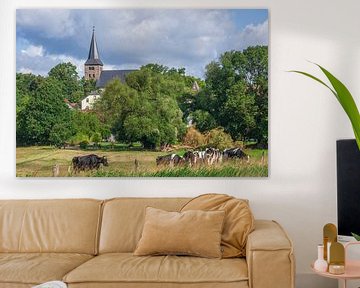 Church with cows, pasture and cloud atmosphere by Torsten Krüger
