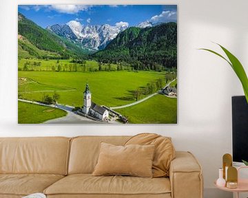 Zgornje Jezersko chuch in the valley aerial view during springtime by Sjoerd van der Wal Photography