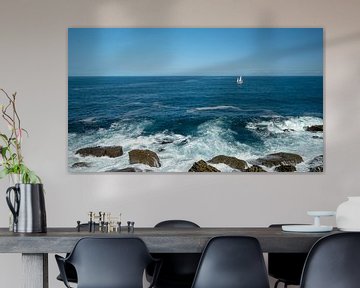 Sea with waves and a sailboat off the coast of San Sebastian by Rick Van der Poorten