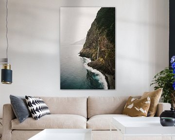 Waterfall along rocky coast Seixal Beach Madeira