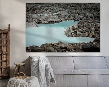 body of water next to a glacier by Sebastian Stef