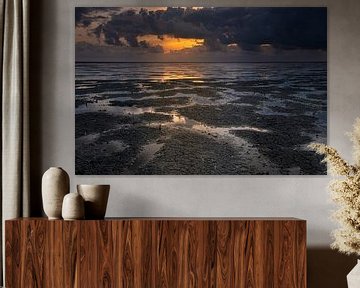 Coucher de soleil sur la mer des Wadden en Frise sur Adrian Visser