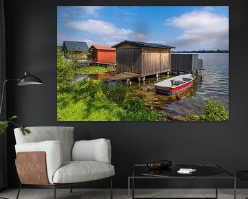 View of boathouses and boat in the town of Zarrentin am Schaal by Rico Ködder