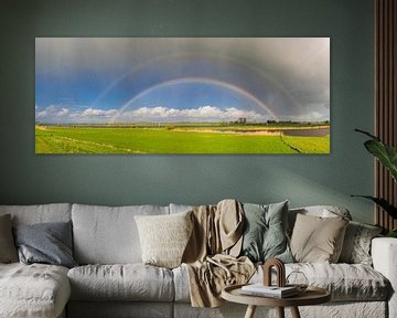 Regenboog tijdens een regen- en hagelbui boven de IJssel. van Sjoerd van der Wal Fotografie