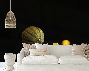 Stilleben mit Melone und Zitronen .