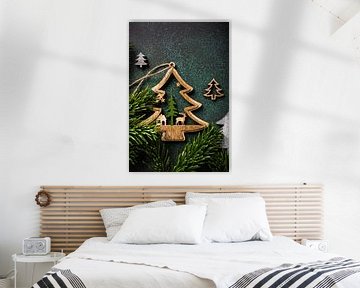 Wooden Christmas trees on green background by Iryna Melnyk