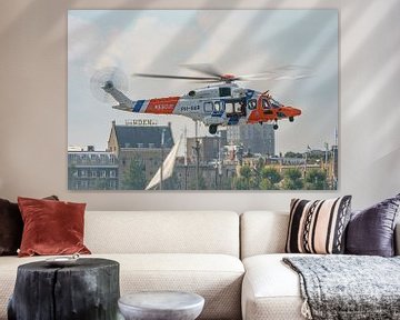 New Coast Guard helicopter (PH-SAR) in action. by Jaap van den Berg