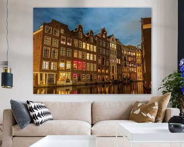 Amsterdam canals during a winter evening with illuminated mercha by Sjoerd van der Wal Photography