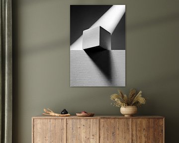 White cube on rectangular cube with stripe on background. van Gerhard de Wit