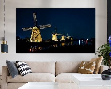 Historic windmills at Kinderdijk in the evening by Erwin Pilon