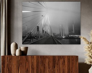 The misty Erasmus Bridge with Rotterdam's skyline along the Maas in the background by Mike Bot PhotographS