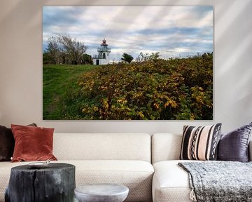 Vuurtoren aan zee en zonnestralen van Martin Köbsch