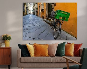 old narrow street in an Italian town with a bicycle by Animaflora PicsStock