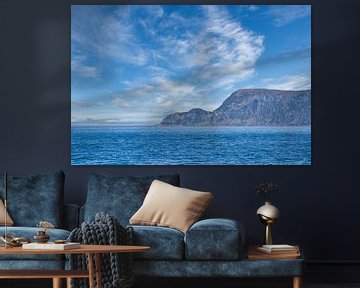 Western Cape in Norway. Fjord and sea with clouds and mountains on the coast by Martin Köbsch