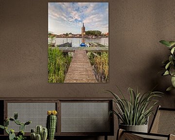 view of Hasselt on the Zwartewater in the evening by Meindert Marinus