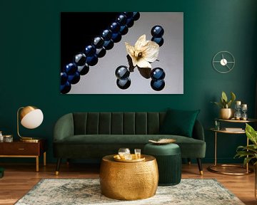 orchid with blue marbles