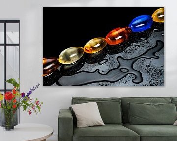 six stones of glass with water