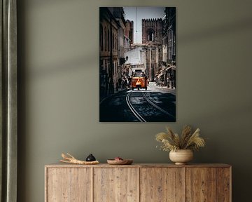 Tuk Tuk driving on the street in Lisbon, Portugal. by Bart Clercx