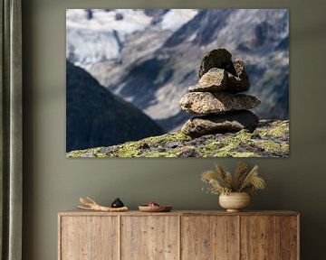Opgestapelde stenen in de Zwitserse Alpen van EJH Photography