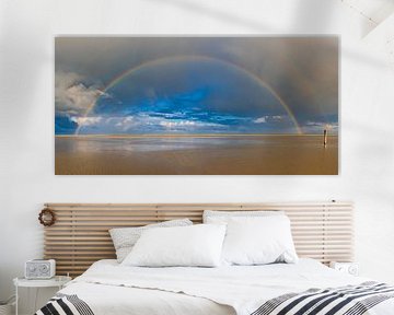 Arc-en-ciel sur la plage de l'île de Texel dans la région de la mer des Wadden sur Sjoerd van der Wal Photographie